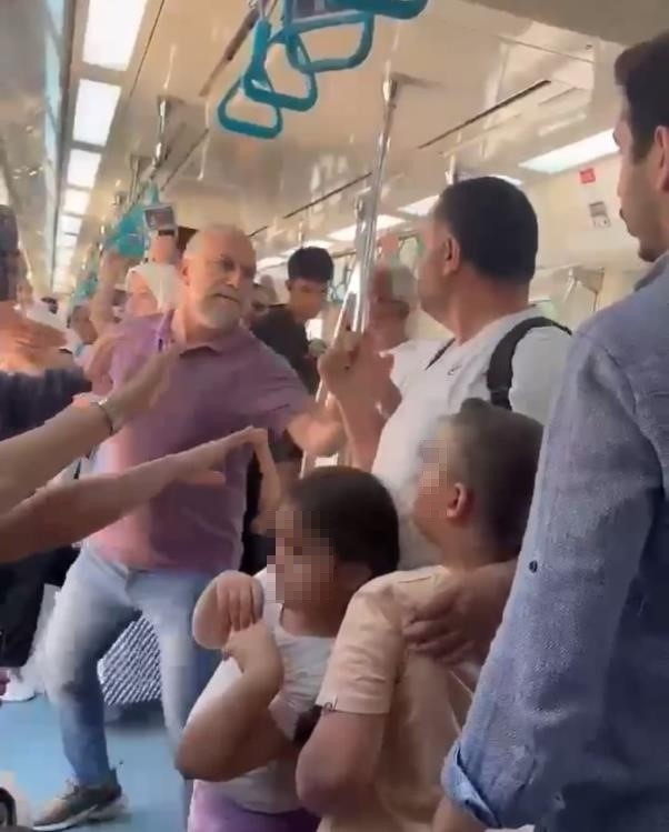 Marmaray'da çocuklarının yanında babayı darbeden şahıs tutuklandı - Resim : 1