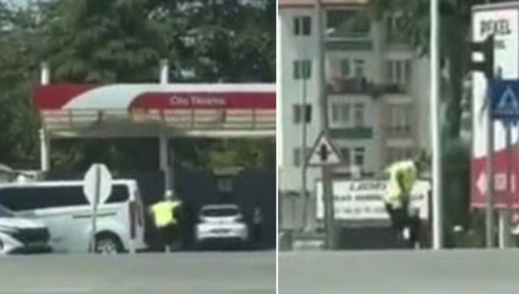 Kargalar trafik polisine saldırdı! Ekip otosuna binip kurtuldu!