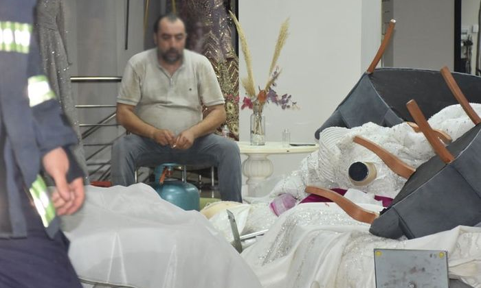 Gelinlikçi dükkanını ateşe vermek istedi, gözaltına alındı