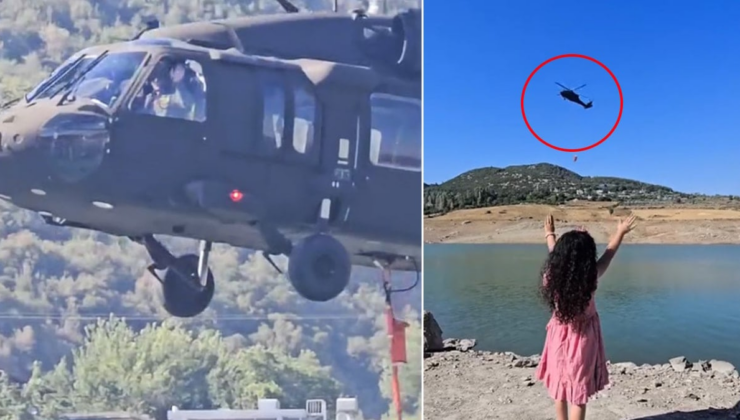 Hatay'da yangın söndürme helikopterinin pilotu ve küçük kız arasında yürek ısıtan görüntü