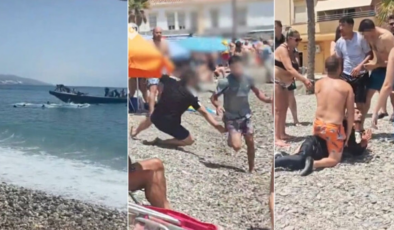 Botlardan atlayan göçmenleri plajda tatilciler kovaladı